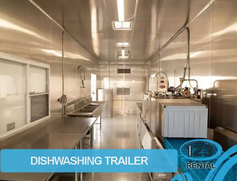 Stainless-steel washing and preparation areas inside a kitchen trailer