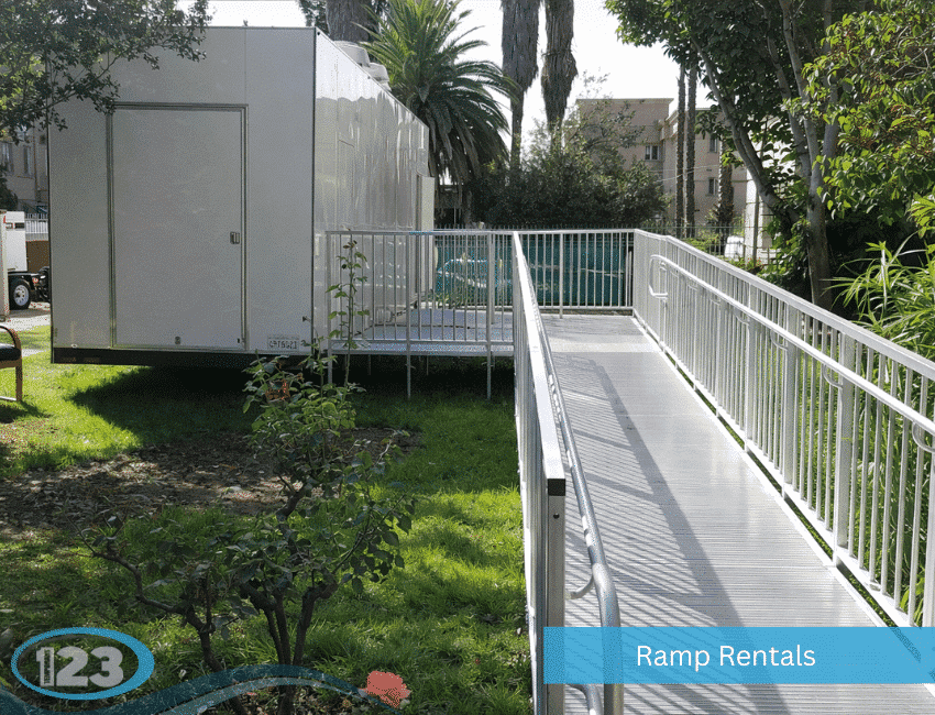 Metal access ramp leading to a kitchen trailer